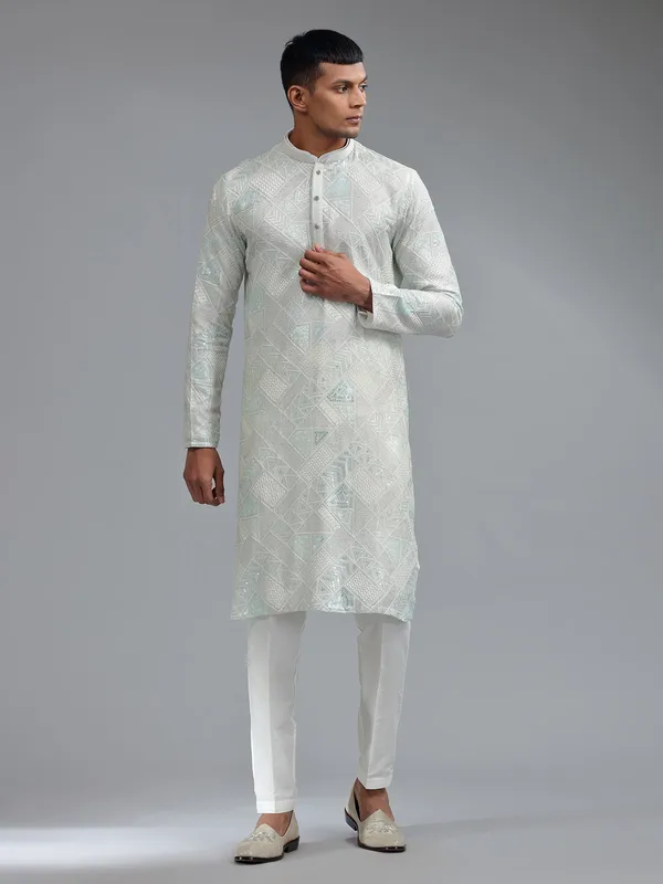 Stunning sea green silk kurta suit