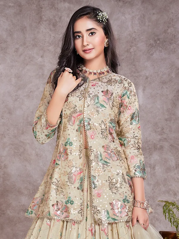Stunning silk beige lehenga choli with jacket