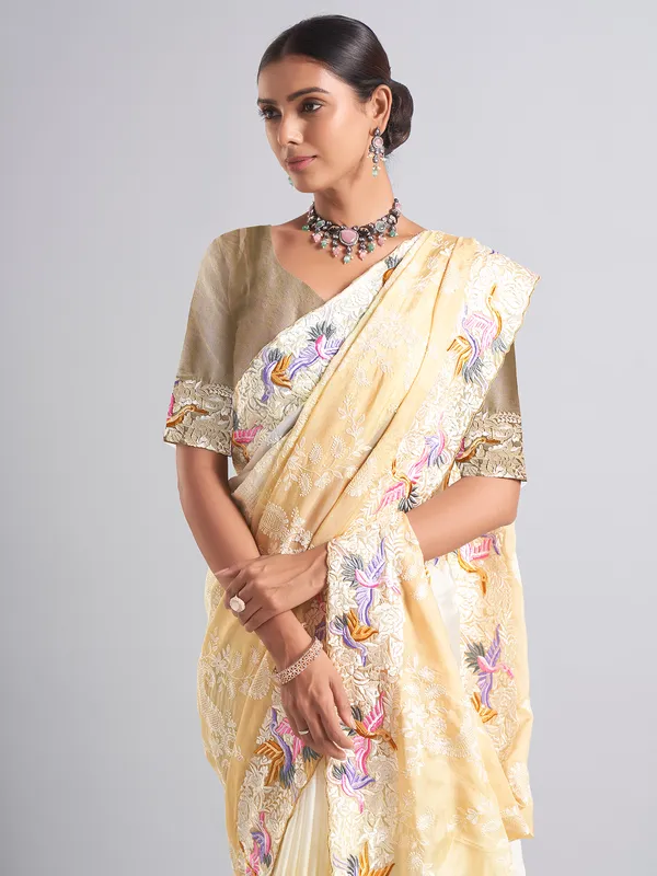 Stunning white and beige chiffon saree