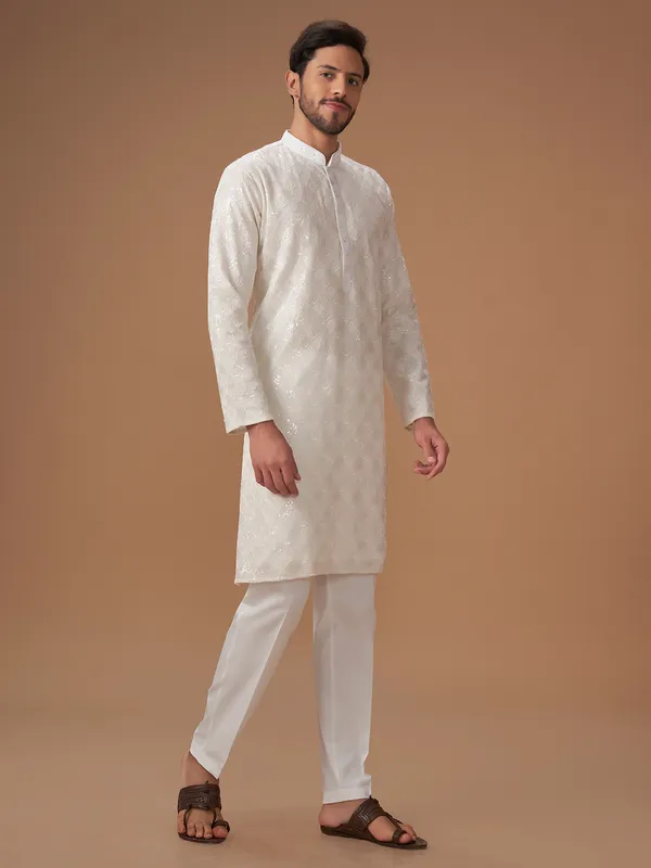 Stunning white kurta suit in georgette