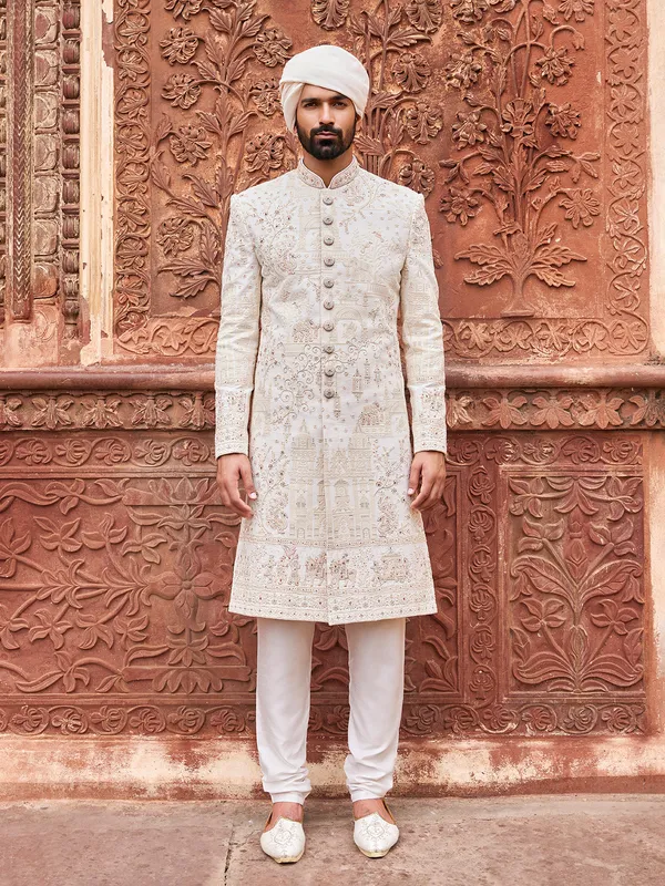 Stunning white raw silk sherwani