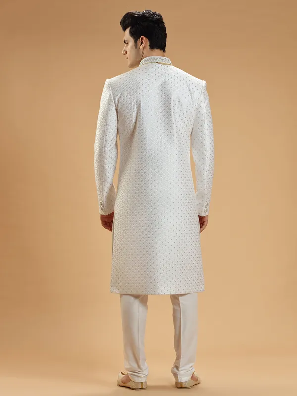 Stunning white silk groom sherwani