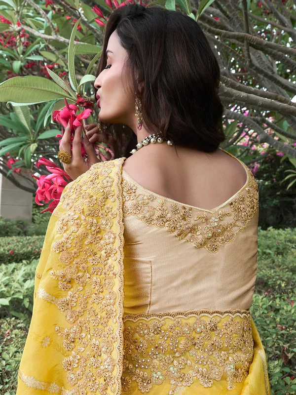 Stunning yellow saree in tissue silk