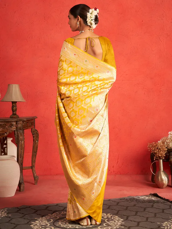 Stunning yellow saree with zari work