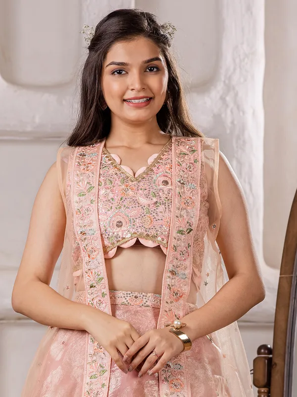 Stunning peach organza lehenga choli for girl