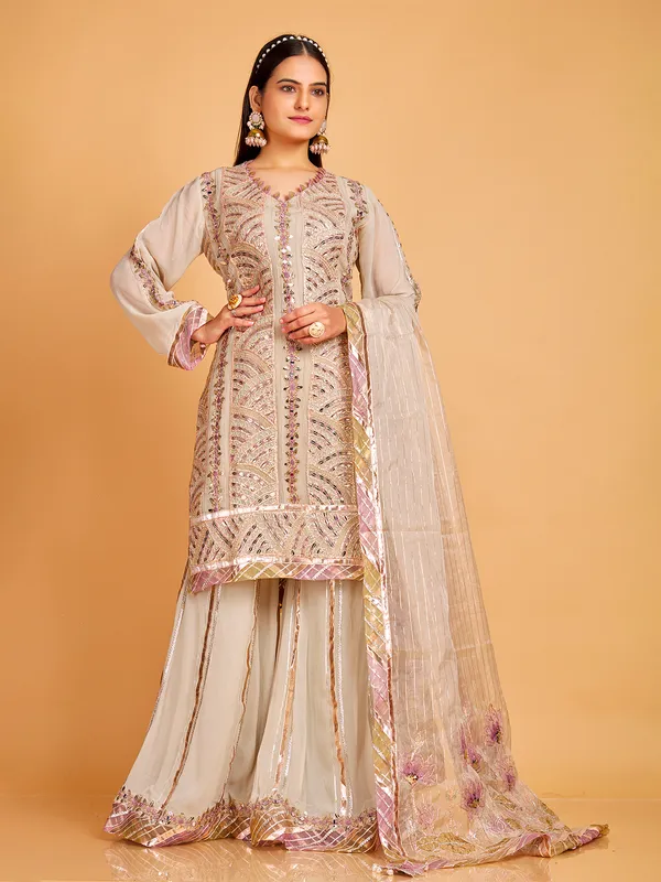 Stylish beige georgette sharara suit