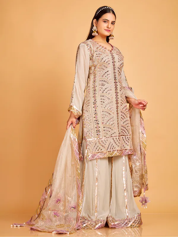 Stylish beige georgette sharara suit