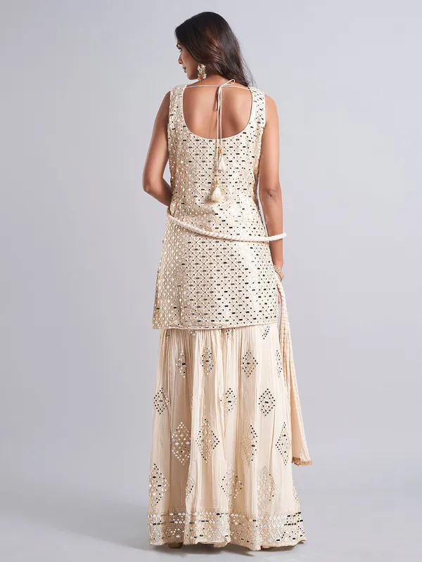 Stylish beige palazzo salwar suit in georgette