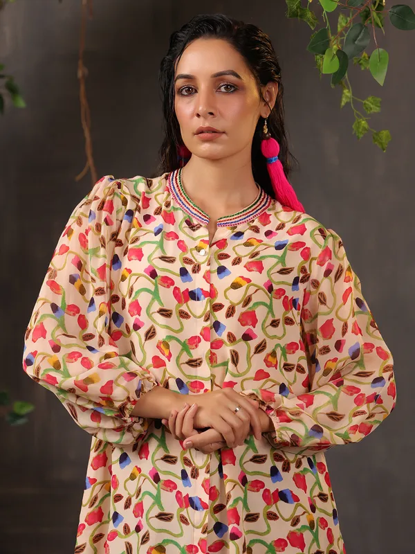 Stylish beige silk top with print