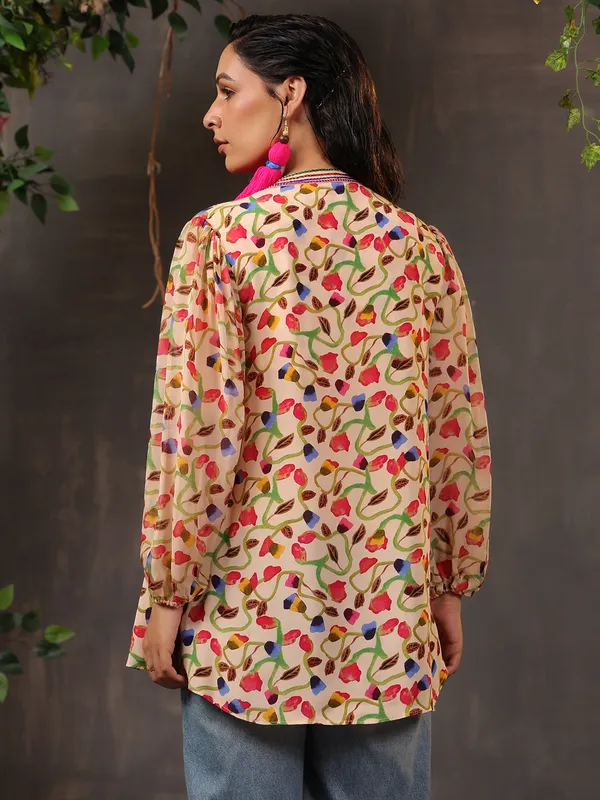 Stylish beige silk top with print