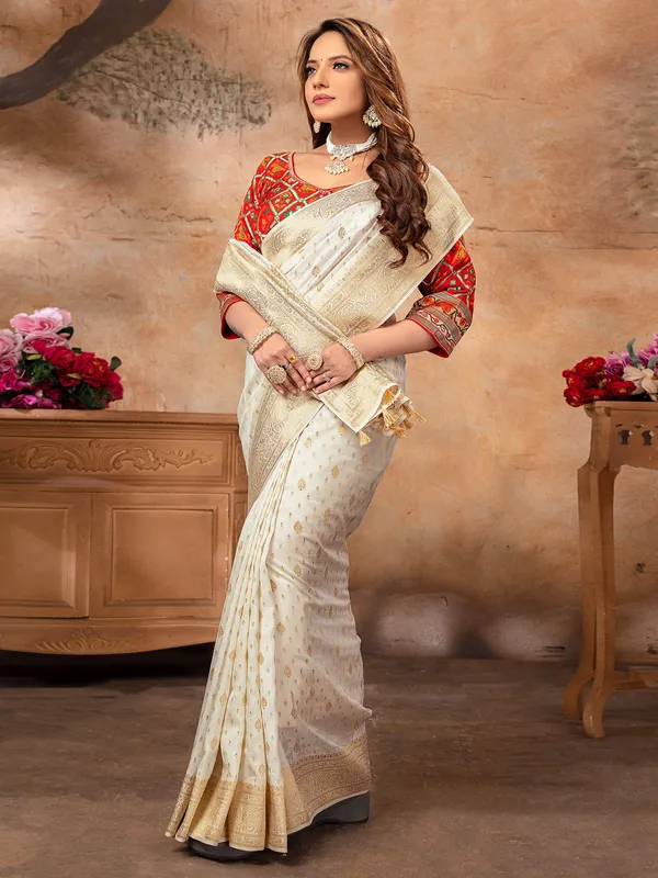 Stylish cream dola silk saree