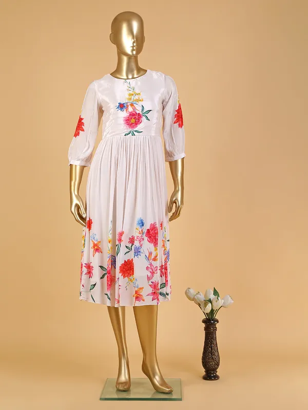 Stylish cream silk floral printed kurti