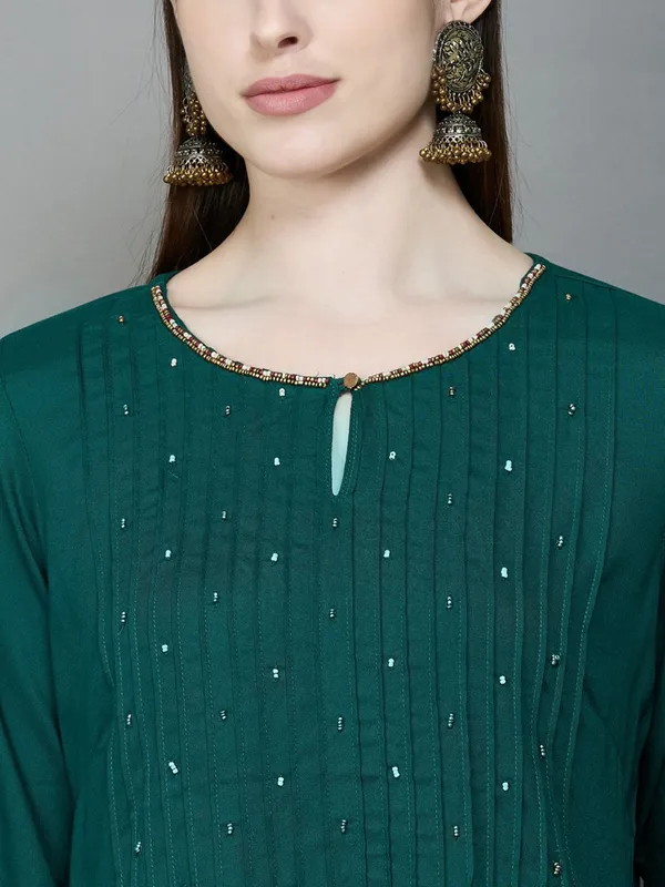 Stylish dark green cotton kurti
