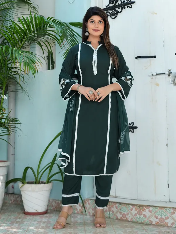 Stylish dark green georgette kurti set
