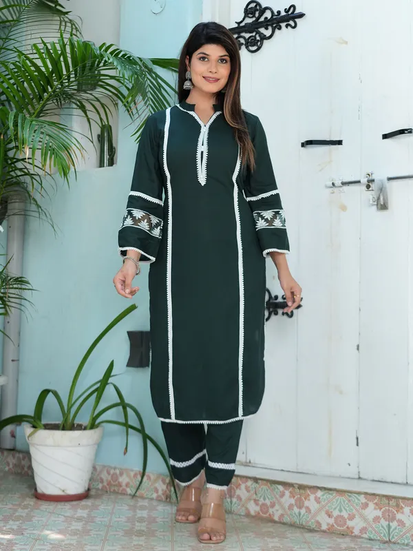 Stylish dark green georgette kurti set