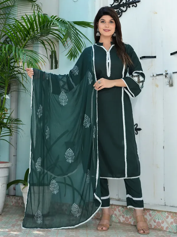 Stylish dark green georgette kurti set