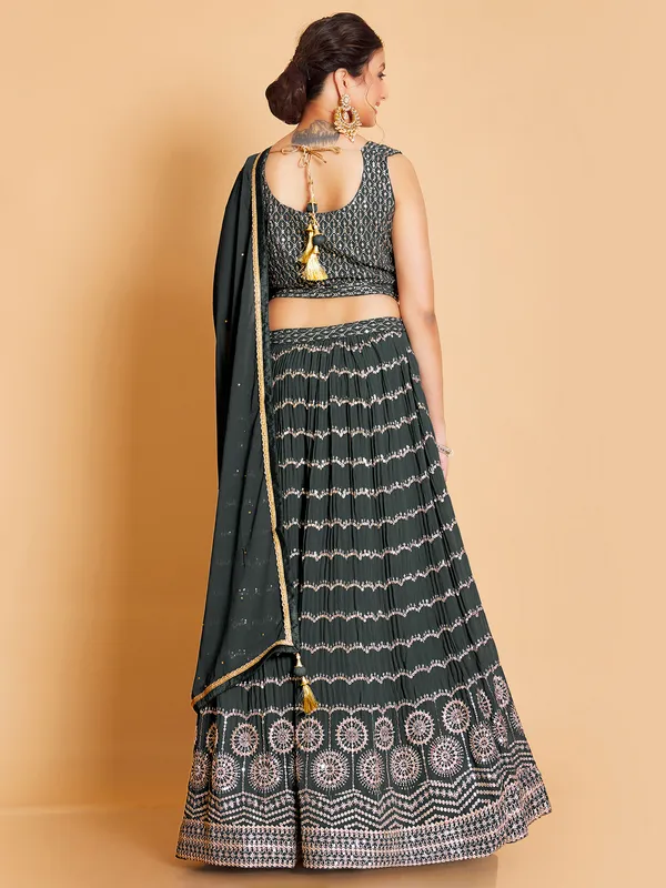 Stylish dark green georgette lehenga choli