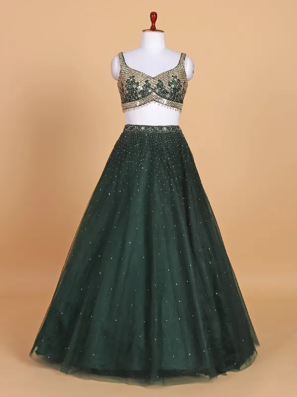 Stylish dark green net lehenga choli