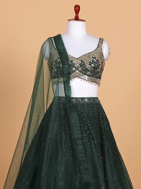 Stylish dark green net lehenga choli