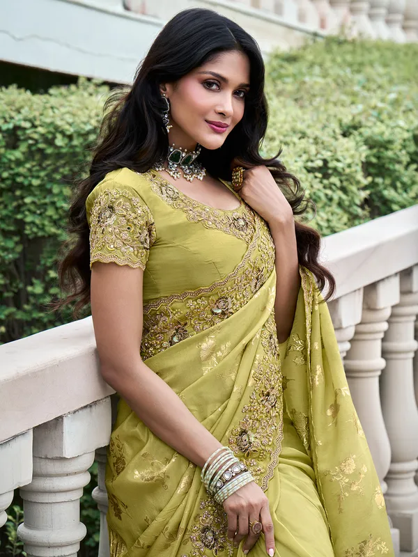 Stylish lemon green tissue silk saree