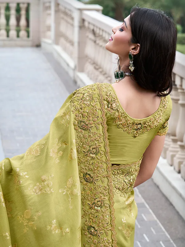 Stylish lemon green tissue silk saree
