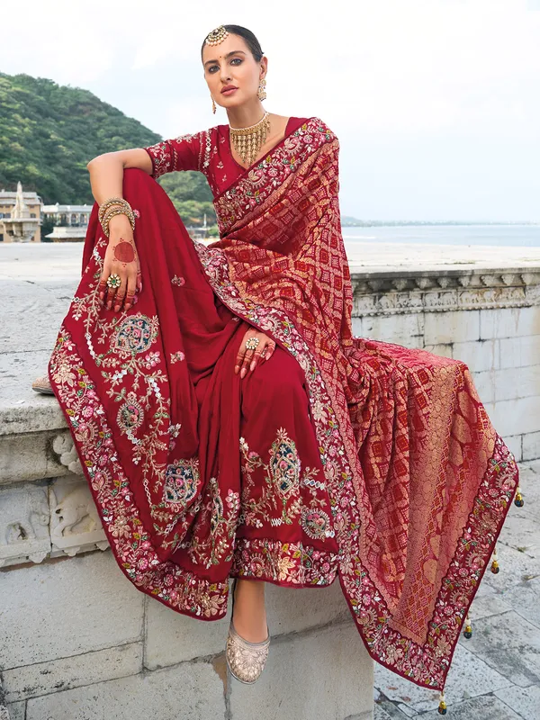 Stylish maroon bandhej and dola silk saree