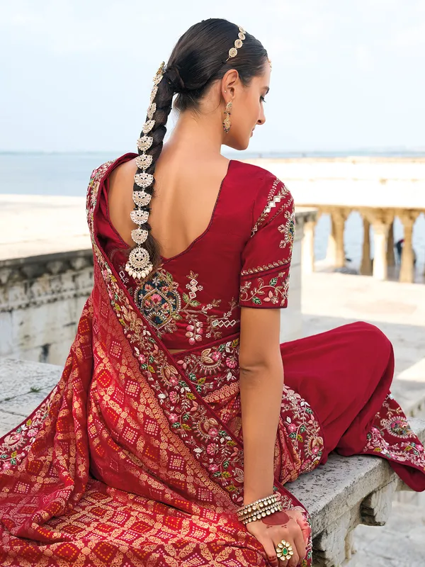 Stylish maroon bandhej and dola silk saree