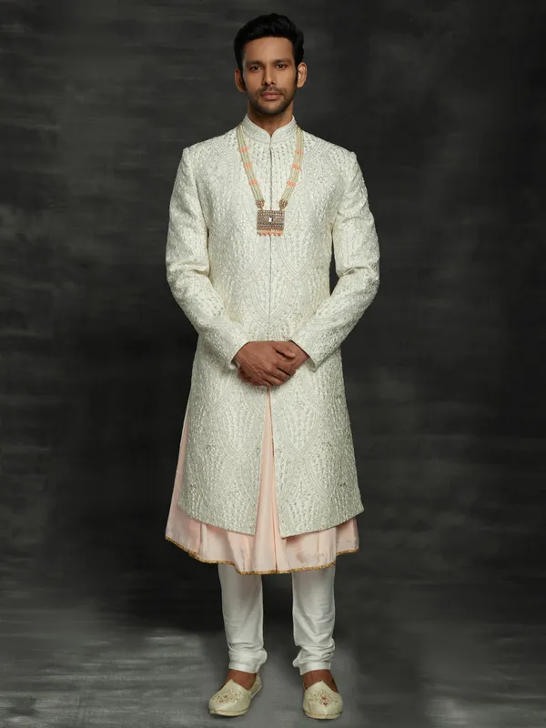 Stylish off white silk double layer sherwani for groom