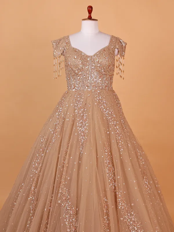 Stylish peach net gown for party wear