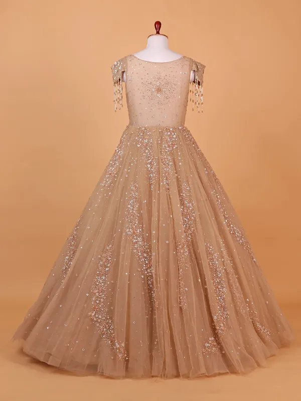 Stylish peach net gown for party wear