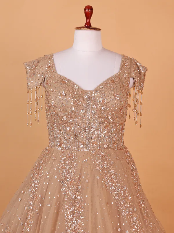 Stylish peach net gown for party wear