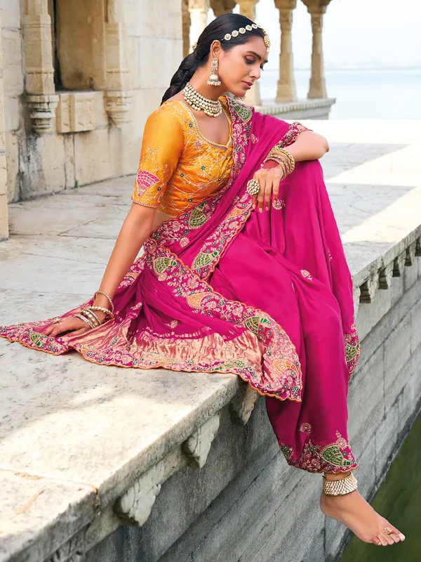 Stylish rani color saree for wedding