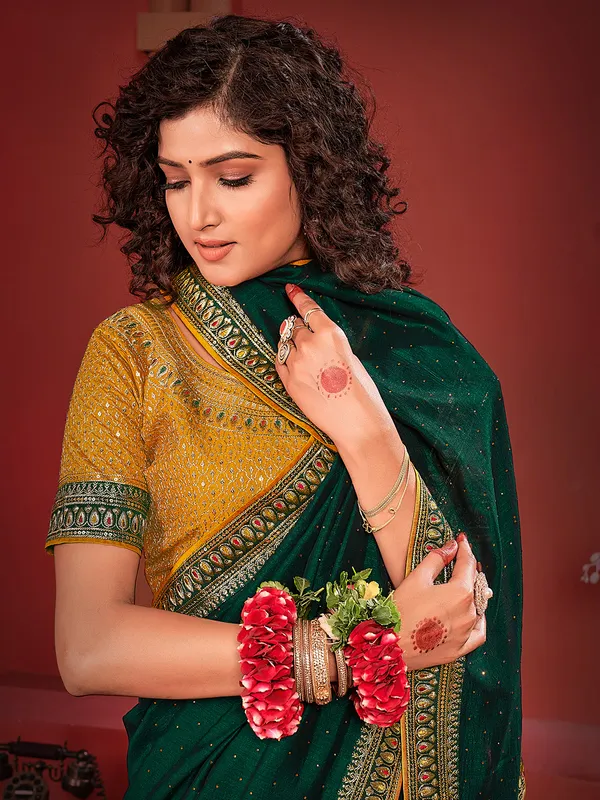 Beautiful green swarovski work silk saree