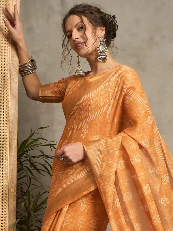 Stylish rust orange pure linen saree with prints