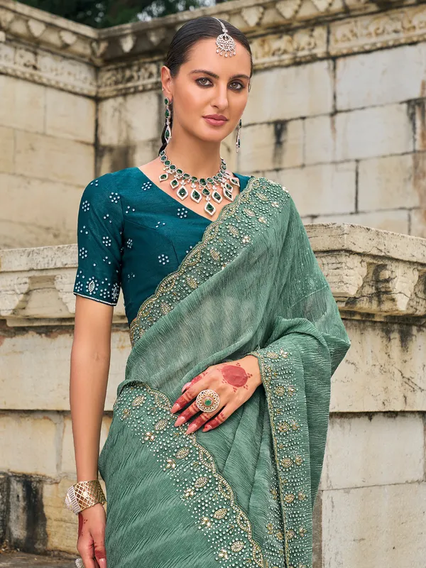 Stylish sea green tissue silk saree