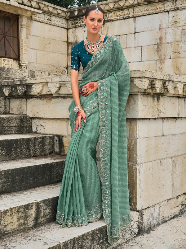 Stylish sea green tissue silk saree