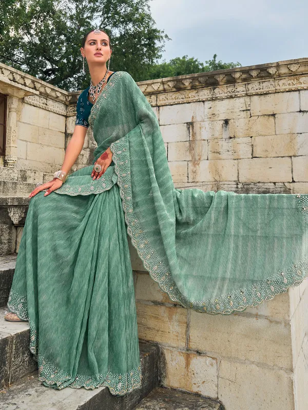 Stylish sea green tissue silk saree