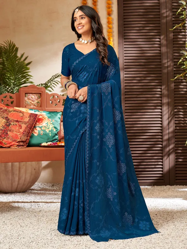 Stylish teal blue chiffon saree