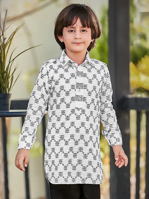 Stylish white and black kurta suit for festive occasions
