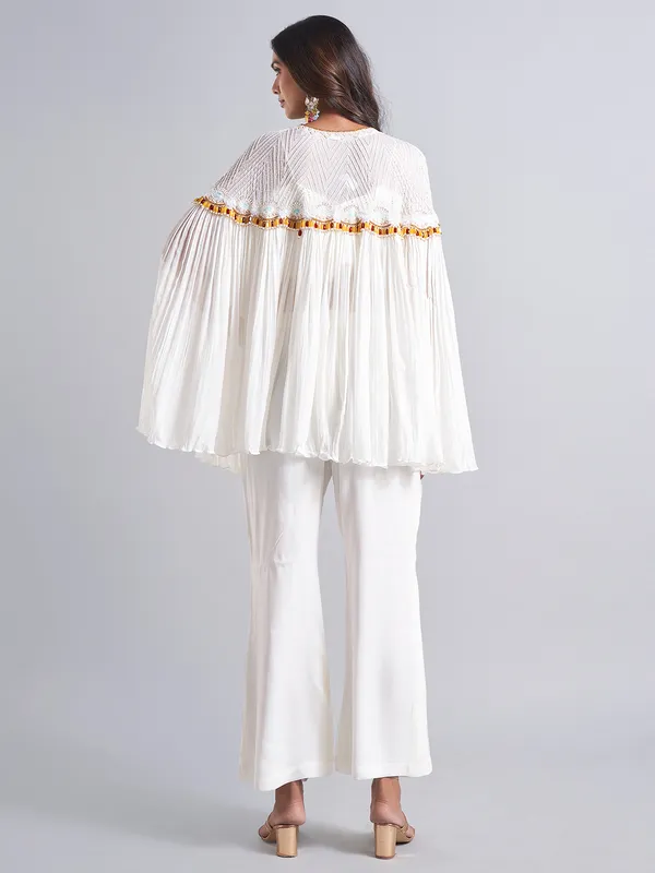 Stylish white palazzo salwar suit in georgette
