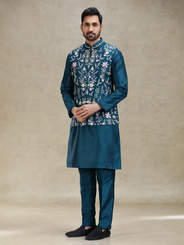Teal blue beautifully embroidered silk kurta jacket set