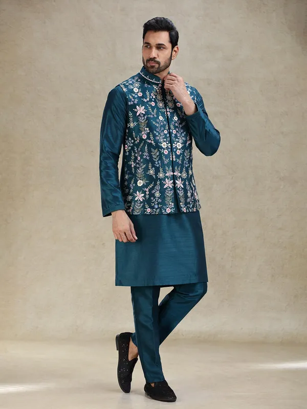 Teal blue beautifully embroidered silk kurta jacket set