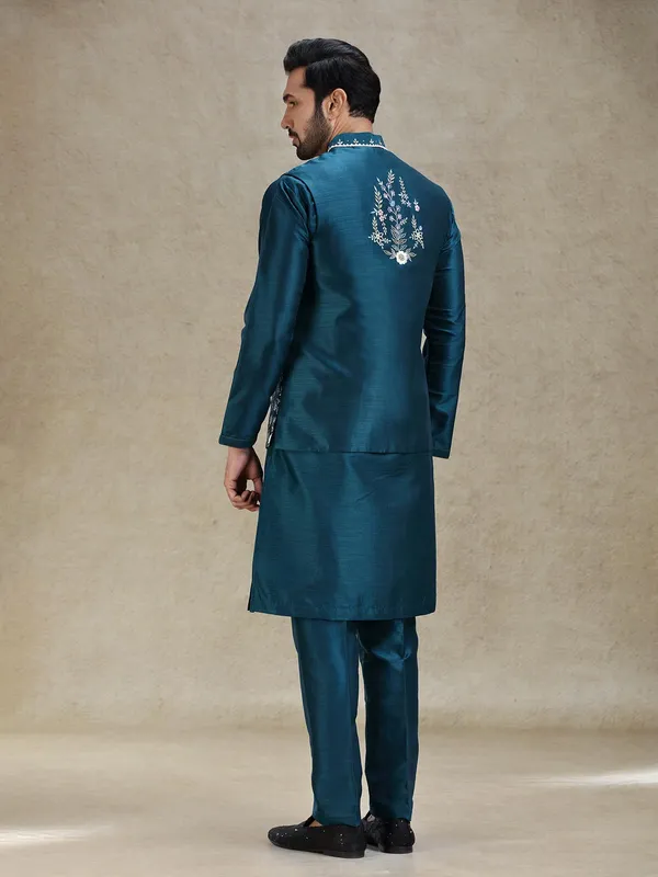 Teal blue beautifully embroidered silk kurta jacket set