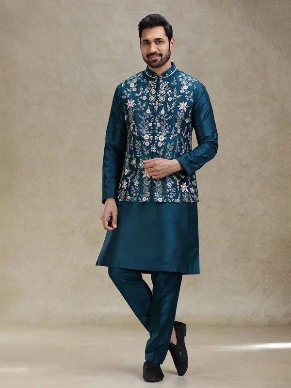 Teal blue beautifully embroidered silk kurta jacket set