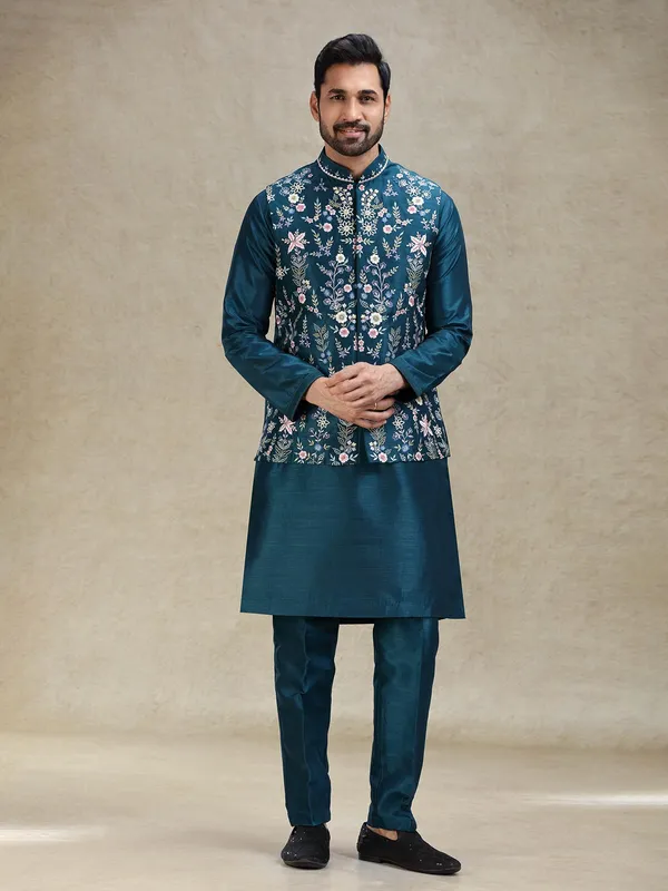 Teal blue beautifully embroidered silk kurta jacket set