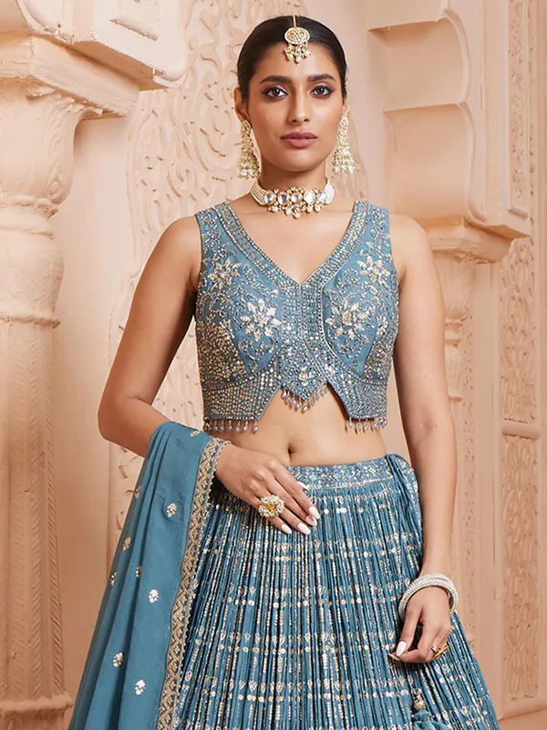 Teal blue chinnon choli with ready made blouse