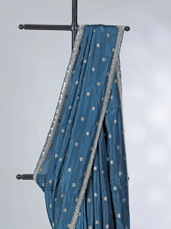 Teal blue dola silk saree with contrast pink blouse