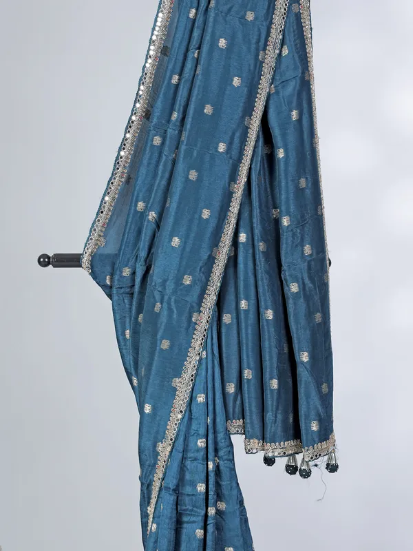 Teal blue dola silk saree with contrast pink blouse