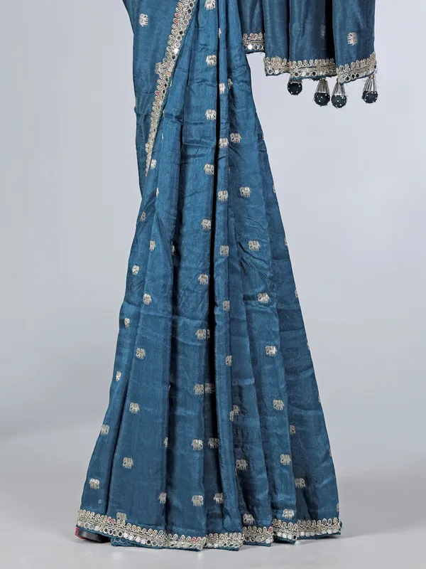 Teal blue dola silk saree with contrast pink blouse