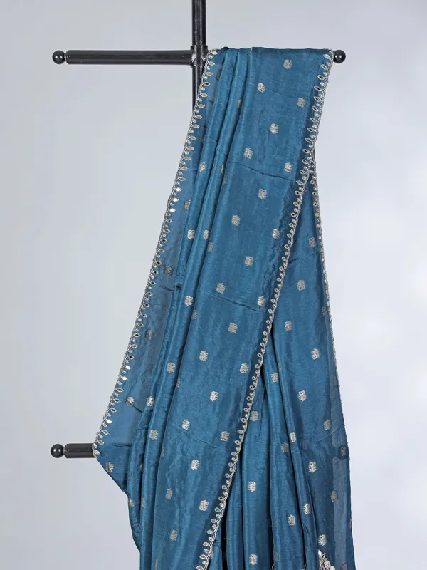 Teal blue dola silk saree with contrast red blouse
